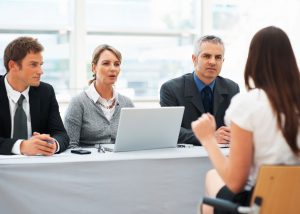 Photo of someone having a panel based interview