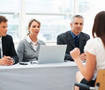 Photo of someone having a panel based interview